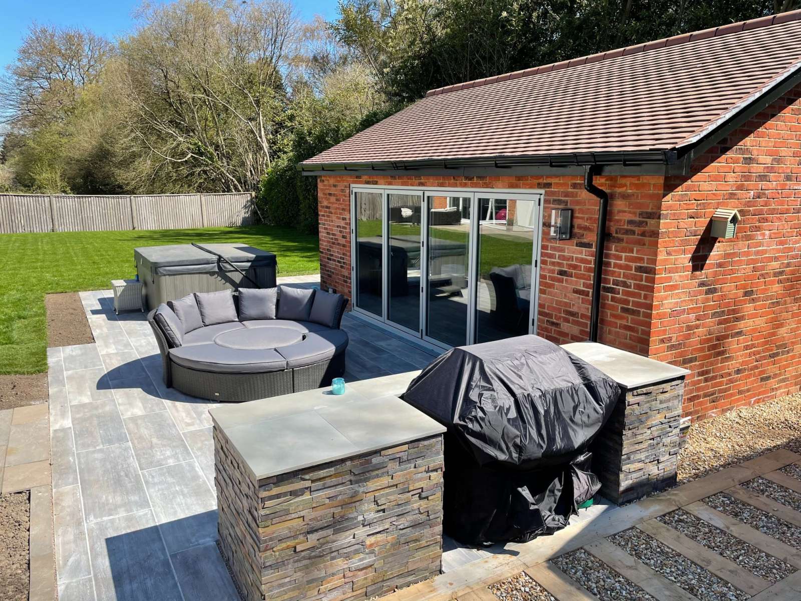 Patio and brickwork in a brick work in a back garden