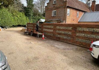 Brick wall construction in garden 1