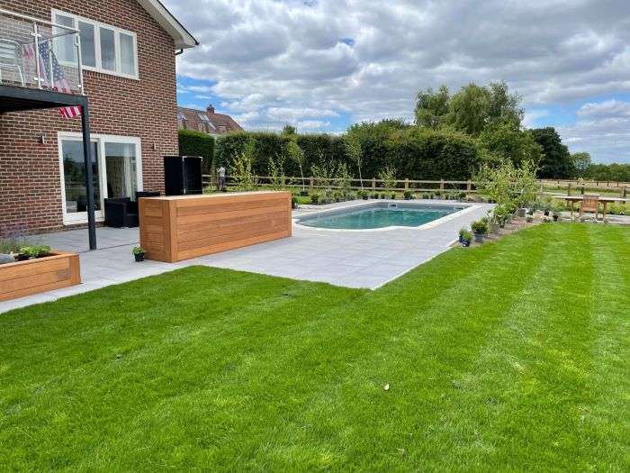 New outside patio area next to pool and garden